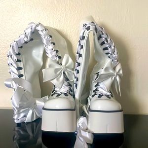 DOLLSKILL BOOTS, been worn once and is in good condition no scratches or scuffs